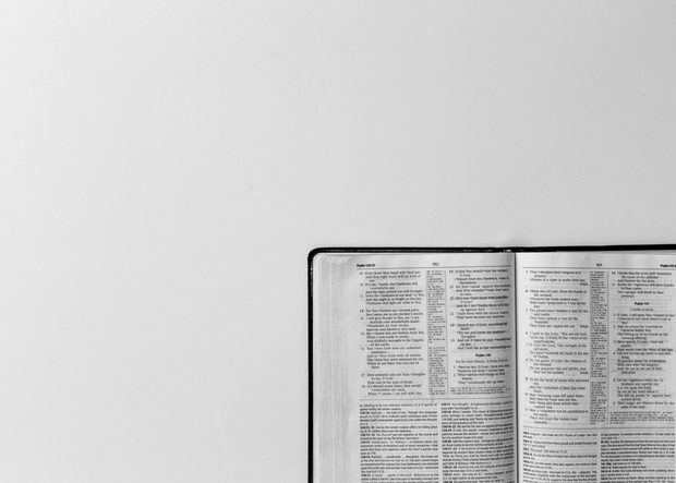 An open Bible on a table